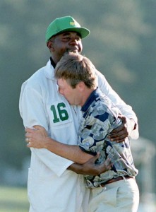 Ben Crenshaw (R) hugs his caddie Carl Jackson on t