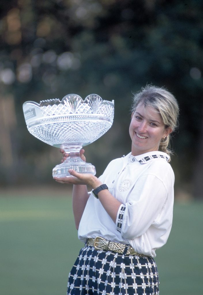 Karrie Webb of Australia with the trophy after winning the Women's British Open Golf Championship held at the Woburn Golf Club, Buckinghamshire, 20th August 1995. Webb won the tournament by six strokes. (Photo by Phil Sheldon/Popperfoto/Getty Images)